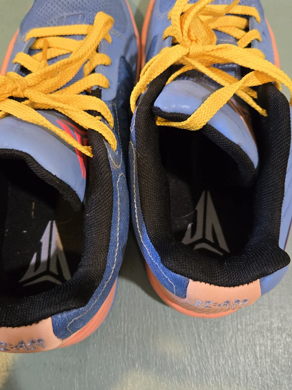 Nike JA 2 Blue Sneakers with Pink Swoosh and Yellow Laces